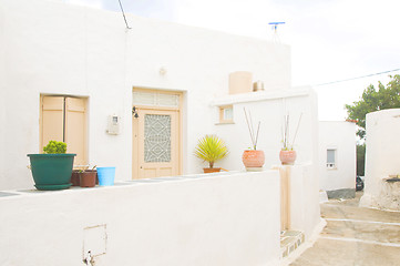 Image showing street scene typical architecture Milos Cyclades Greek Island Gr