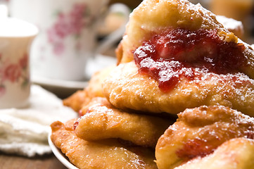Image showing Sweet doughnuts with rose marmelade