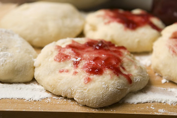 Image showing Sweet doughnuts with rose marmelade