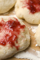 Image showing Sweet doughnuts with rose marmelade