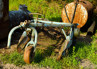 Image showing Retro rusty potato digging agricultural machinery 