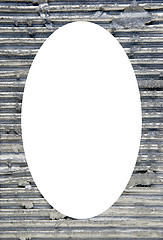 Image showing Metal finish on wall and white oval in center 
