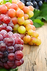 Image showing Black and pink grapes closeup. 