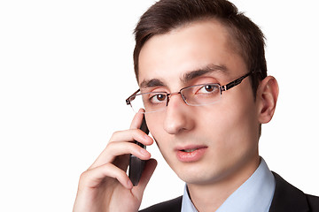 Image showing Young businessman talking on the mobile phone