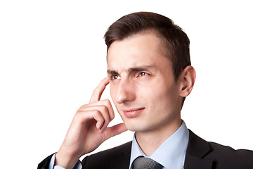 Image showing Young businessman thinking