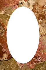 Image showing Old paint wall loosing it and white oval in center 