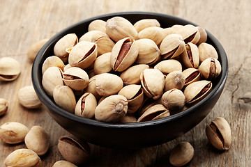 Image showing close up of a bowl of pistachio nuts