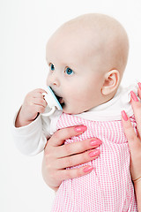 Image showing baby girl with a pacifier