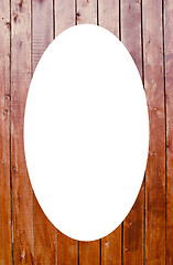 Image showing Planks wall background and white oval in center 