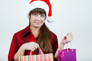 Image showing A girl in a Christmas hat