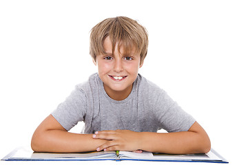 Image showing Boy with book. isolated on white background 