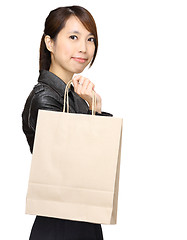 Image showing young asian woman with shopping bag