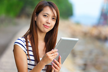 Image showing woman using tablet computer