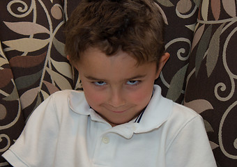 Image showing Child with sinister smirk posing.