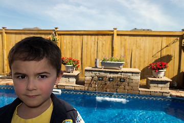 Image showing Child by a pool