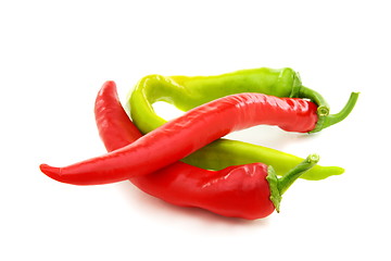 Image showing Burning red and green peppers.