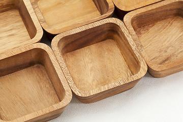 Image showing six square wooden bowls