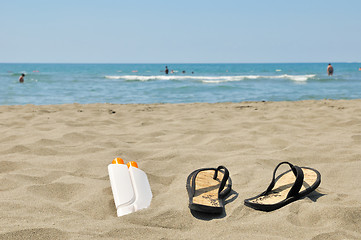 Image showing Slippers on beach