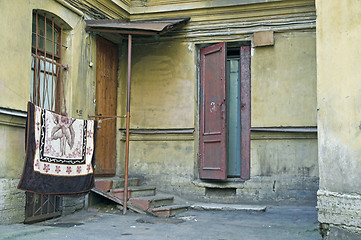 Image showing Doorway to old apartment building in city outskirts