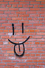 Image showing Brick Wall and Smile Graffiti 