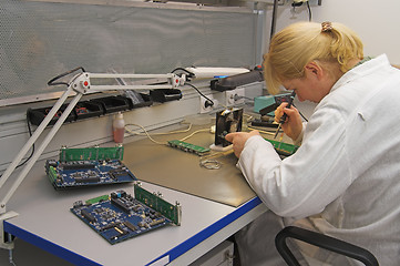 Image showing Engineer working with circuits