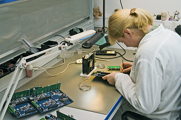 Image showing Engineer working with circuits 