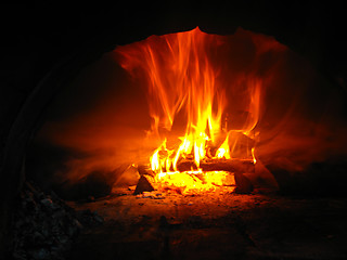 Image showing Fire wood burning in the furnace