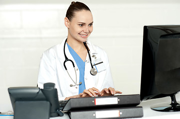 Image showing Medical professional working on computer