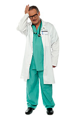 Image showing Full length shot of unhappy doctor in uniform