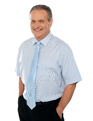 Image showing Casual business executive with hands in pocket