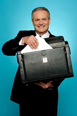 Image showing Businessman keeping documents safely