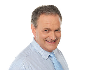 Image showing Closeup portrait of smiling senior male executive