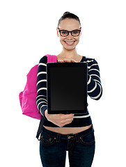 Image showing College girl showing blank touch screen device