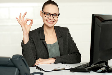 Image showing Corporate woman showing excellent gesture