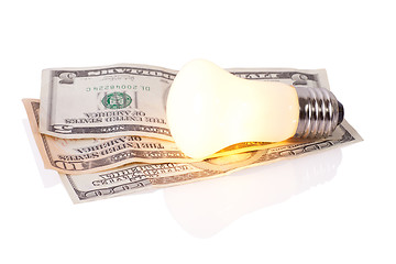 Image showing bulb on dollars