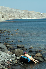 Image showing woman sunbathing