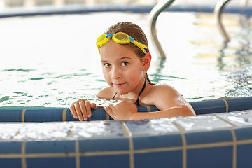 Image showing Child relaxing at whirlpool