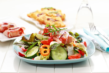 Image showing Vegetable salad with prosciutto rolls