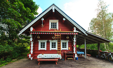 Image showing Red Log Cabin n the Forest