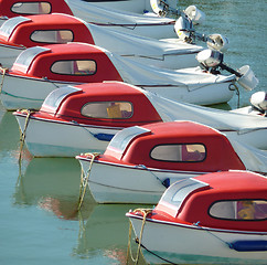 Image showing Red & white boats