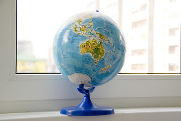 Image showing The globe on the windowsill