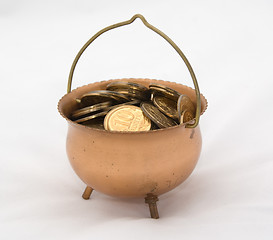 Image showing Small cauldron with coins