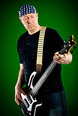 Image showing man with a guitar, bass player