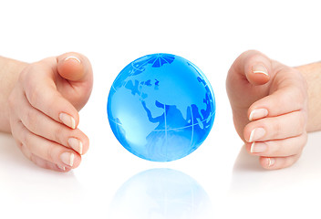 Image showing hand of the person holds globe