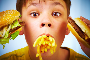 Image showing child and fast food.