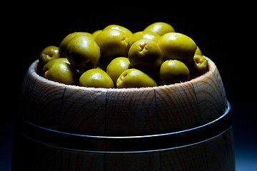 Image showing olive in small barrel