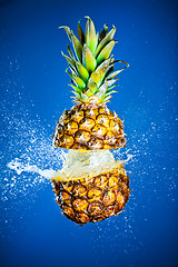 Image showing Pineapple splashed with water