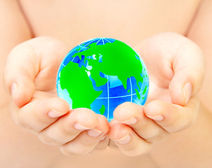 Image showing hand of the person holds globe