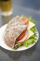 Image showing Ham, cheese and tomato sandwich