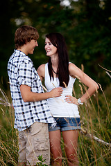 Image showing young love couple smiling outdoor in summer 